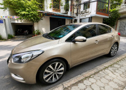 Chính chủ Cần bán xe kia k3 AT 1.6 màu vàng cát cho người dùng xe biển Hà Nội