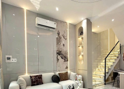 Tấm ốp tường phòng khách đẹp than tre