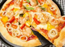 Pizza nướng củi – Bí quyết tạo nên hương vị đặc trưng